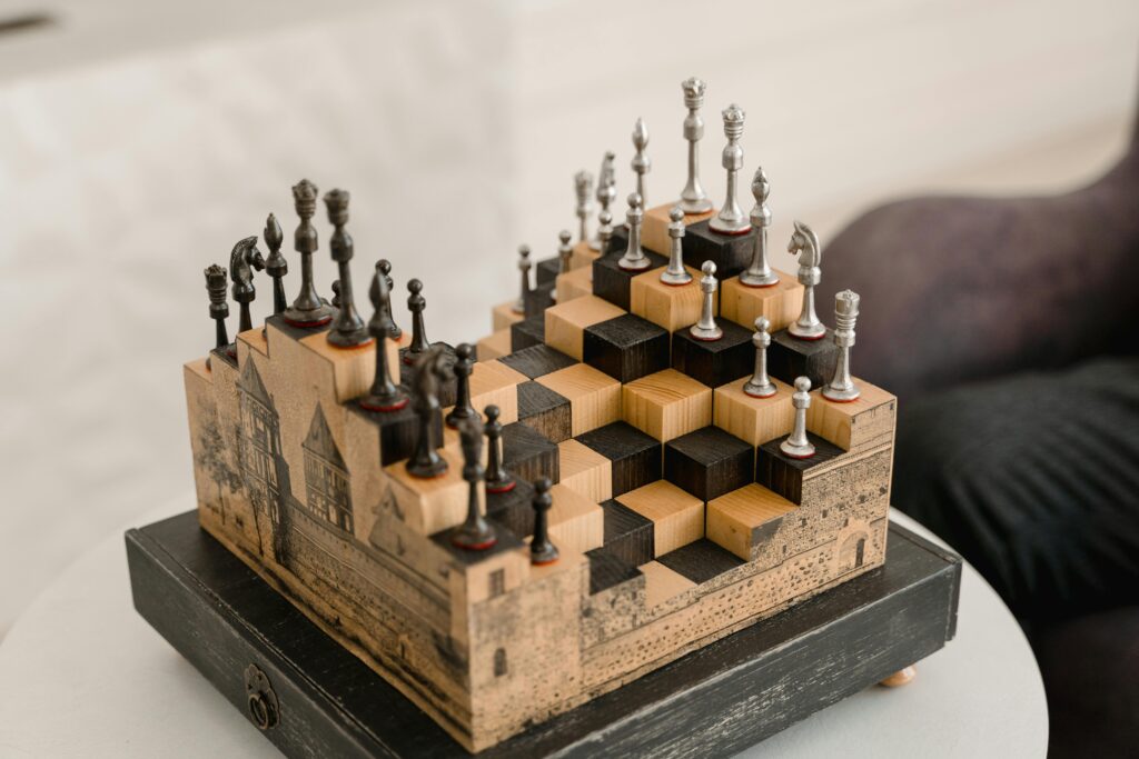 pexels photo 6599549 6599549 1 Artistic chess set with 3D pieces on an intricate wooden board indoors.
